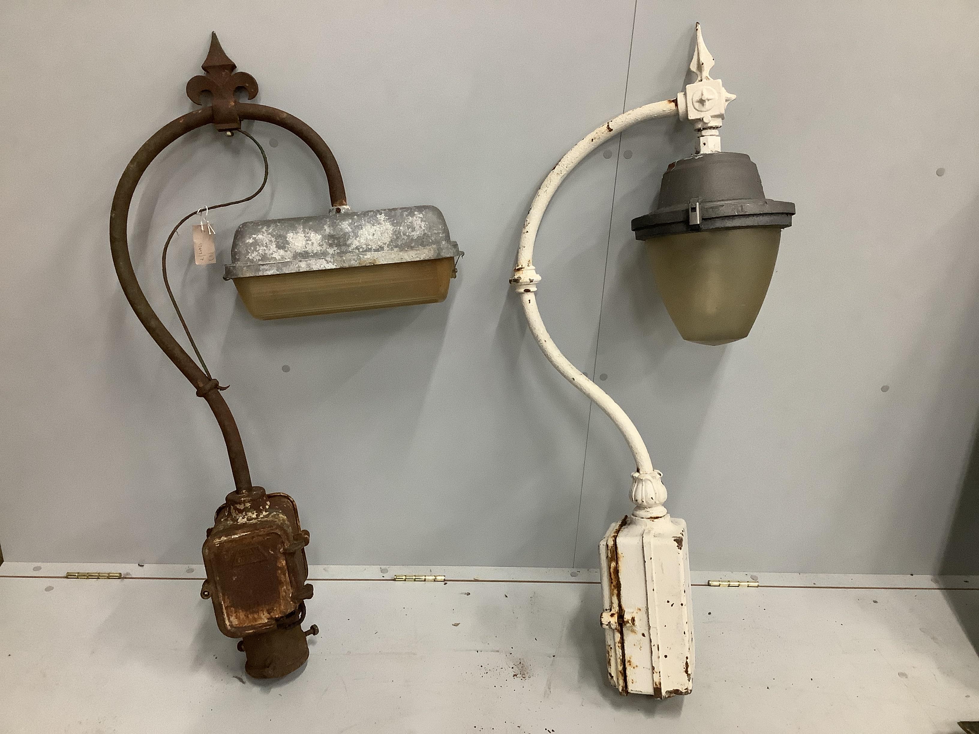 Two vintage swan neck iron street lights, height 115cm